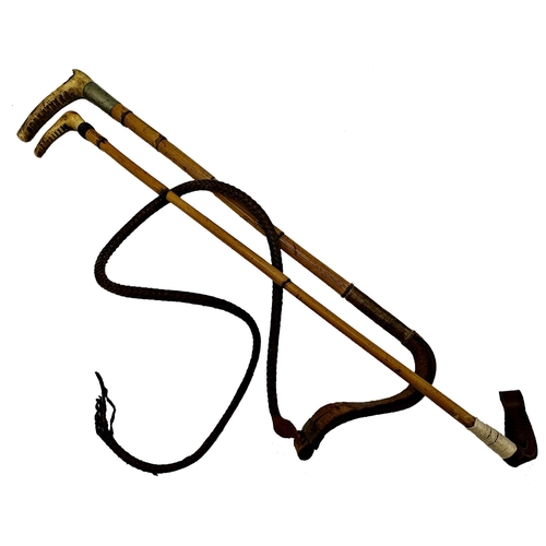 746 - Horn handled riding crop together with a further horn handled whip (2)