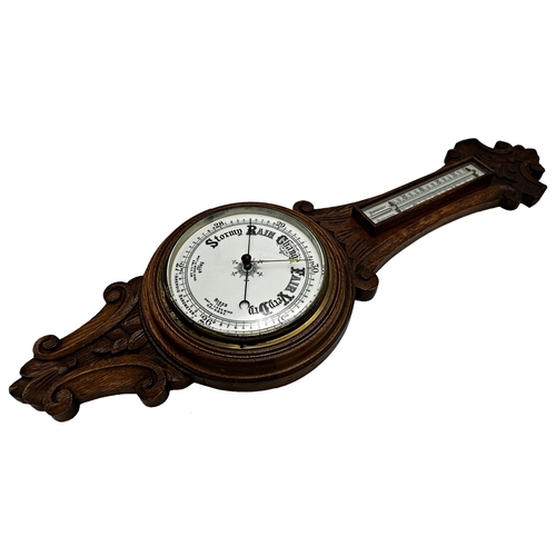 73 - Oak aneroid barometer with mercury thermometer, 91cm high