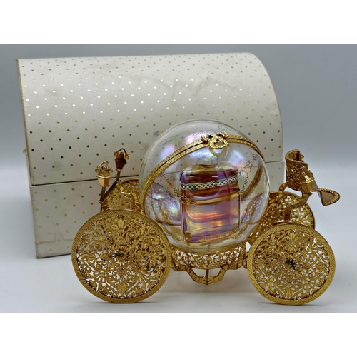 384 - Caron-Royal Messager limited edition 32/100 perfume bottle within a gilt carriage with box and paper... 