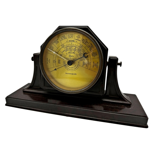 74 - Taylor Stormoguid Bakelite table top barometer, 28cm long