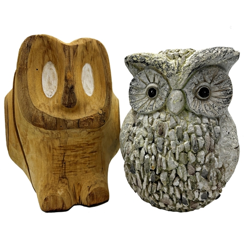 714 - A carved treen and a pottery owl, each 27cm high approx (2)