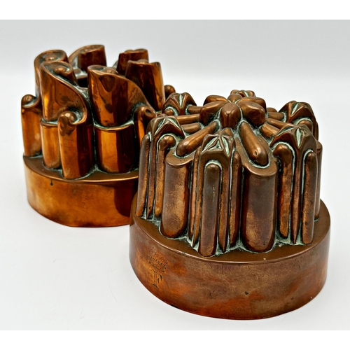 640 - Pair of antique copper jelly moulds in the manner Benham and Froud, 12cm high (2)