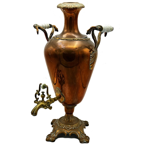 642 - A regency copper twin handled tall baluster samovar, 51cm high