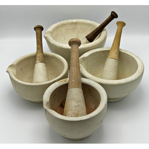 481 - Four good quality pestle and mortars of varying sizes.  Diameter 24cm / 21cm / 18.5cm / 17cm