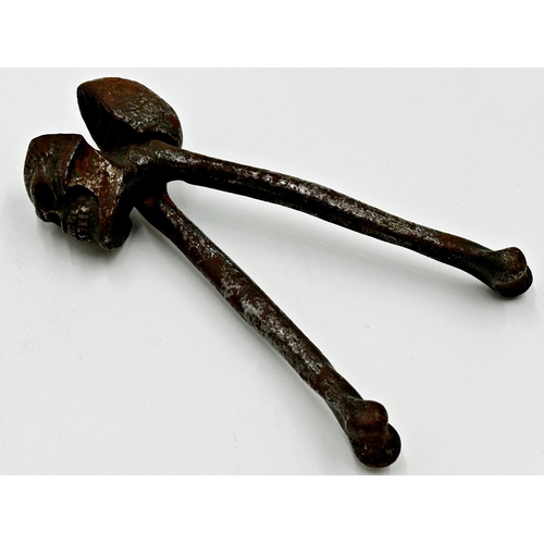 373 - Good novelty iron skull and bones nutcracker, 15.5cm long