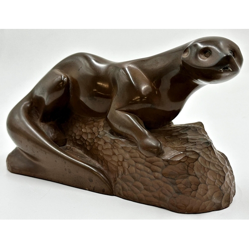 610 - Richard Fisher bronzed cold cast resin study of an otter, 14 x 25cm