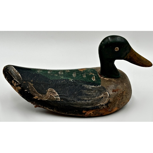 567 - Antique treen decoy duck with original painted finish, 28cm long with a further large eastern teak t... 