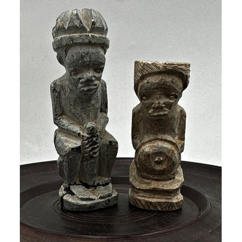 523 - Interesting tribal carved plaster chess set (complete), kept with three turned hardwood boxes