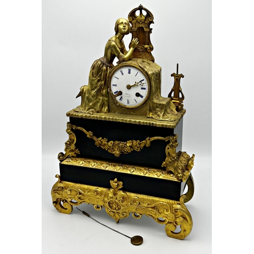 78 - Good French gilt cast metal and black marble figural mantle clock, with key and pendulum H 45cm