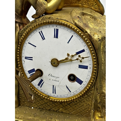 78 - Good French gilt cast metal and black marble figural mantle clock, with key and pendulum H 45cm