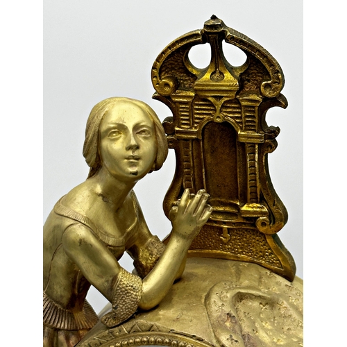 78 - Good French gilt cast metal and black marble figural mantle clock, with key and pendulum H 45cm