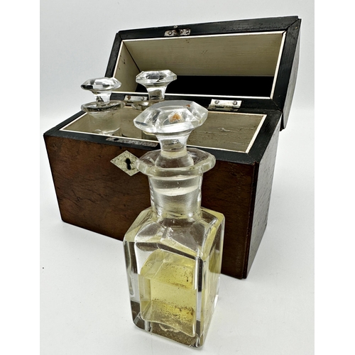 494 - Antique gentleman's travelling boxed set of three cologne bottles