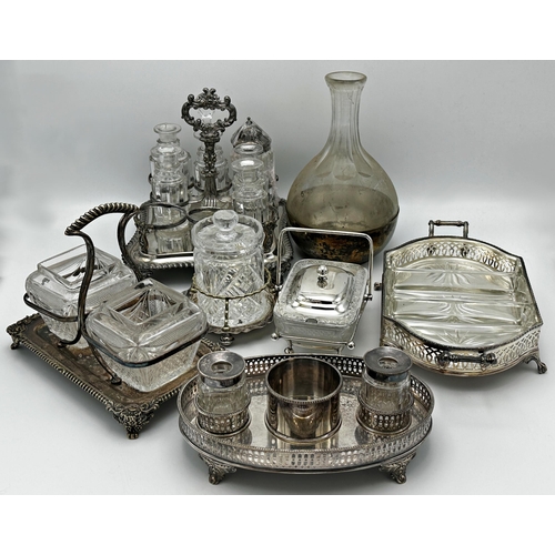 339 - Mixed collection of glass-fitted silver plated items to include a twin bottle oval desk standish, an... 