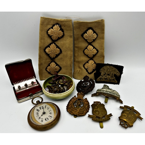 386 - Mixed cabinet lot to include an Art Deco brass cased pocket watch with shaped mount and Arabic numer... 