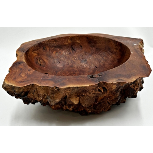 565 - Good hollowed olive wood fruit bowl with naturalistic exterior, 38cm wide