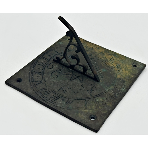 613 - Antique bronze sundial dated 1639 with indecipherable incised inscription, 15 x 15cm