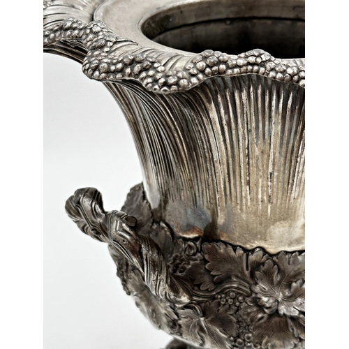 326 - Antique silver plated twin handled urn shaped wine bucket, with floral tapered rim, twin knotted han... 