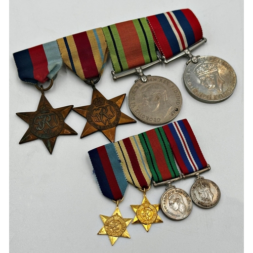 378 - Four WWII war medals with matching miniatures with ribbons and bar, to include The Africa Star (2)