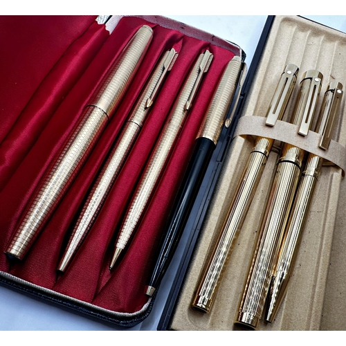 385 - Parker and Sheaffer three piece pen sets, the fountains with 14k nibs, with a further Parker pen