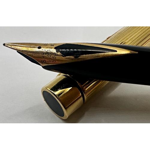 385 - Parker and Sheaffer three piece pen sets, the fountains with 14k nibs, with a further Parker pen