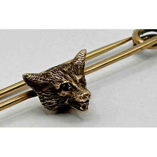 175 - 9ct fox head tie pin, ruby set eyes, 6.8cm long, 6.8g, in associated Asprey box