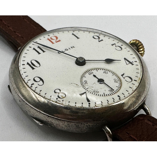 21 - WWI silver Elgin trench watch, 32mm case, enamel dial with red number 12 and subsidiary second dial,... 