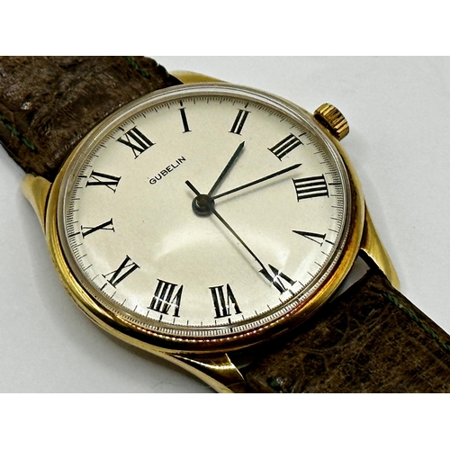 22 - 1950s 18ct Gubelin dress watch, 36mm case, silvered dial with Roman numerals, period leather bracele... 