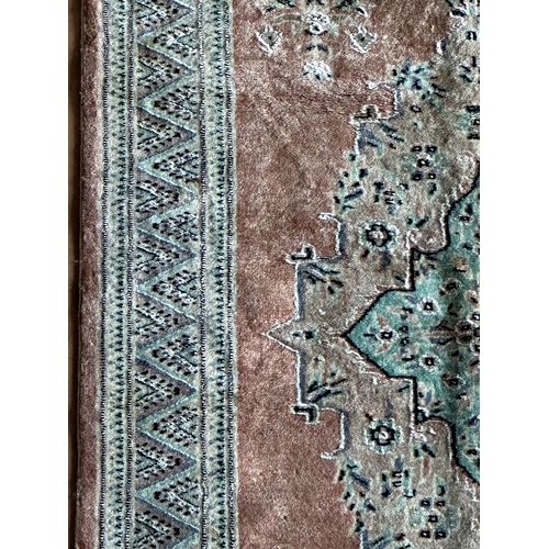 1583 - Persian silk blend Keshan rug, large central medallion and darted boarders on pink ground, L174 x W9... 