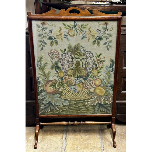 1587 - Early 20th century beech framed woolwork screen, depicting an overspilling basket of fruit and flowe... 