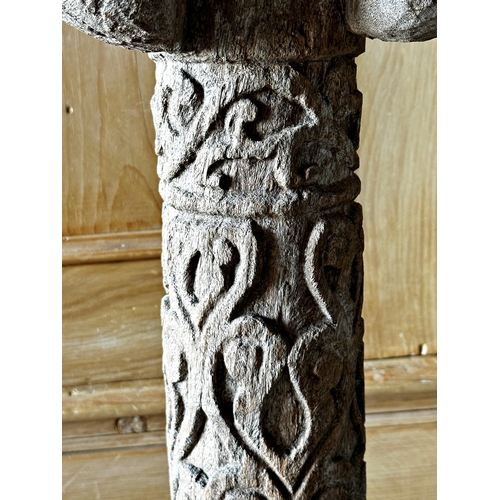 517 - Tribal interest- Carved hardwood tiki type pole mounted by a seated tribesman, 126cm high