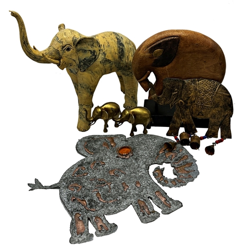 713 - A mixed collection of ornamental elephants