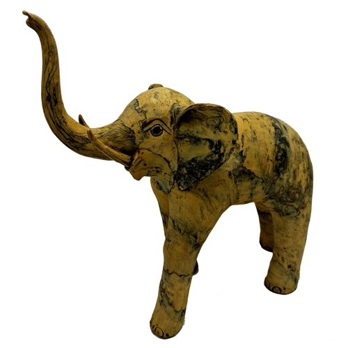 713 - A mixed collection of ornamental elephants