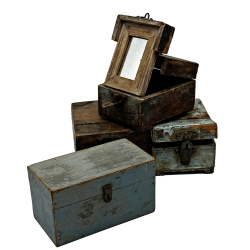 590 - Three vintage Indian primitive travel boxes, the hinged lids enclosing a further hinged foldable mir... 