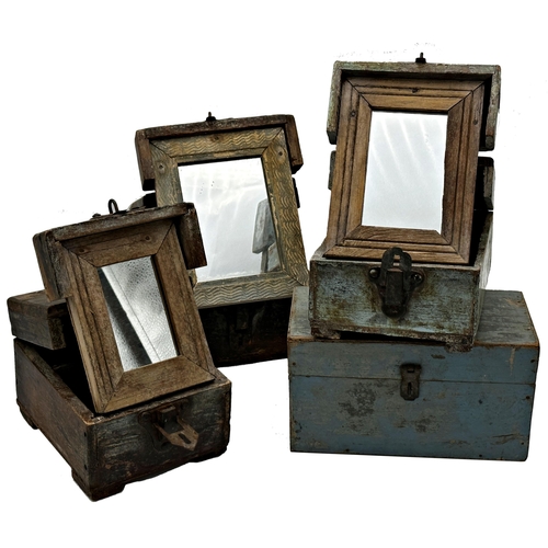 590 - Three vintage Indian primitive travel boxes, the hinged lids enclosing a further hinged foldable mir... 