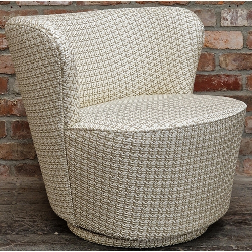 1239 - Andrew Martin upholstered swivel chair, 71cm high