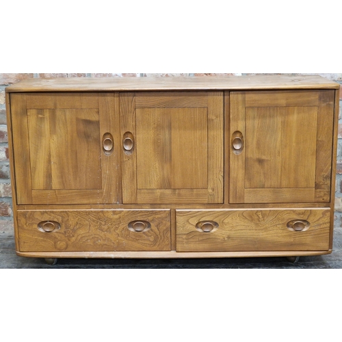 1238 - Vintage Ercol light elm sideboard, three cupboard doors over two drawers, 76.5cm high x 130cm long, ... 