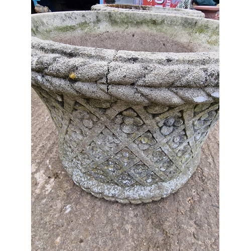 1043 - Pair of good quality weathered Haddonstone garden planters, with reticulated flowerhead and basket w... 