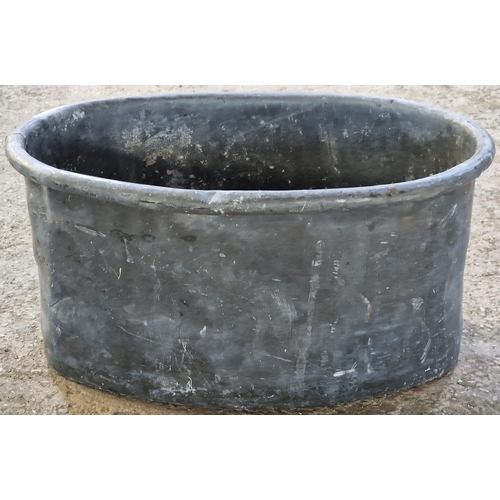 1044 - Vintage lead planter of oval form, 26cm high x 51cm wide