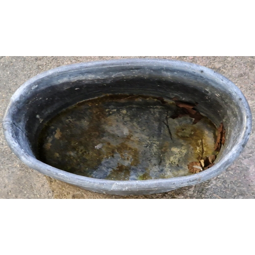 1044 - Vintage lead planter of oval form, 26cm high x 51cm wide