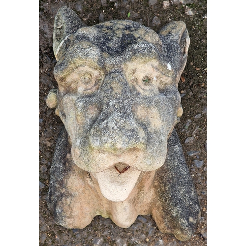 1053 - Weathered stone hanging wall mask in the form of a big cat, 38cm high