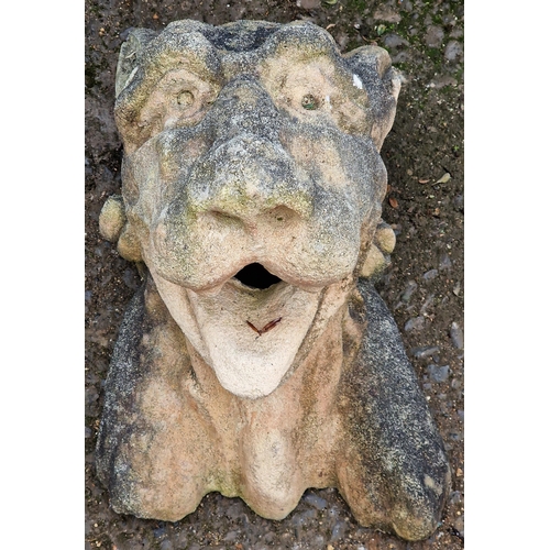 1053 - Weathered stone hanging wall mask in the form of a big cat, 38cm high