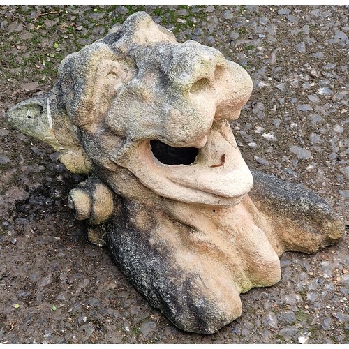 1053 - Weathered stone hanging wall mask in the form of a big cat, 38cm high