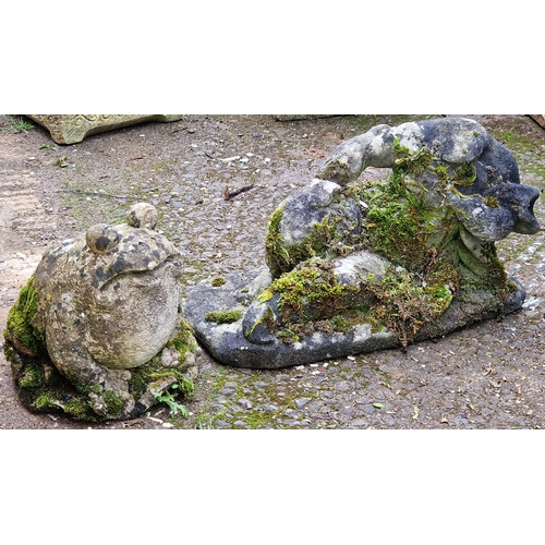 1055 - Weathered stone recumbent figure (missing head) together with a weathered reconstituted stone garden... 