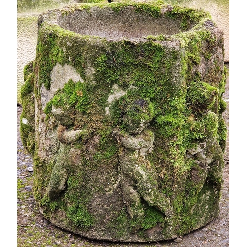 1058 - Well weathered octagonal garden planter with inscribed front panel, decorated with various figures, ... 