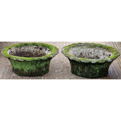 1060 - Pair of weathered garden planters with flared rims and latticework detail, 20cm high x 51cm wide, to... 