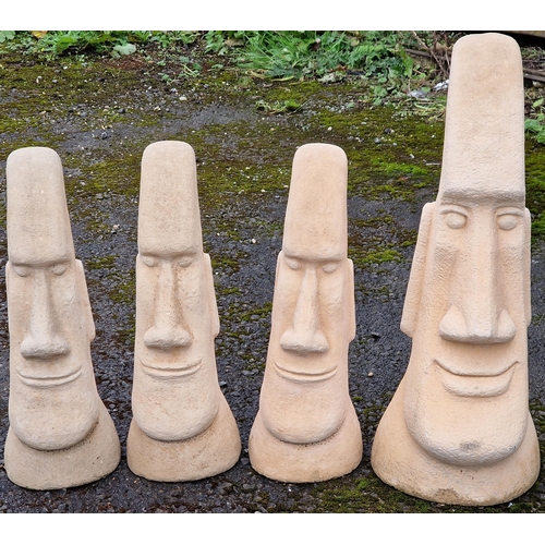 1068 - Three reconstituted stone Easter Island heads, 54cm high, together with a further larger example, 72... 