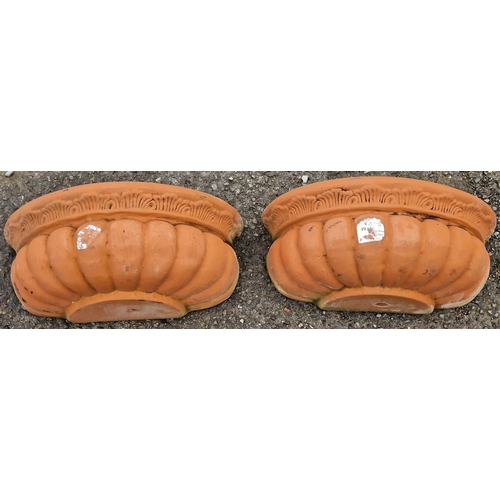 1070 - Pair of terracotta wall planters with lobed bowls, 17cm high x 42cm wide