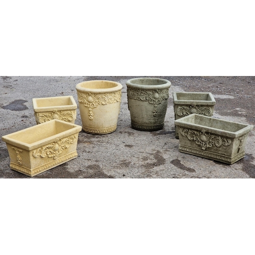 1081 - Willowstone - A pair of reconstituted stone circular garden planters with scrolling acanthus detail,... 