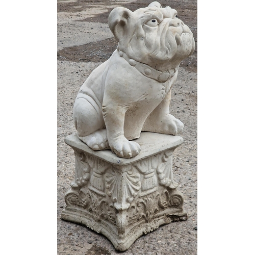 1084 - Reconstituted stone statue of a bulldog raised on a square pedestal base, 68cm high