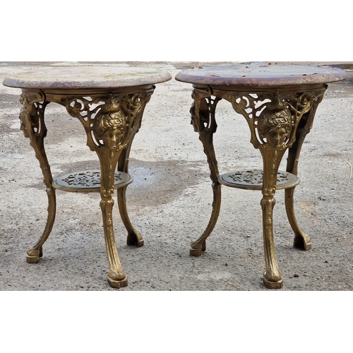 1092 - A pair of gilt cast iron 'Britannia Head' pub tables with gilt painted finish, 72cm high x 61cm diam... 